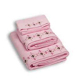 Комплект махровых полотенец из трех предметов хлопок розовый