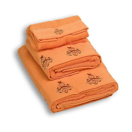 Комплект махровых полотенец из трех предметов хлопок оранжевый