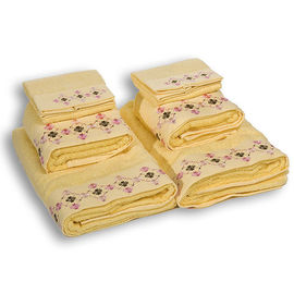 Комплект махровых полотенец из шести предметов хлопок желтый