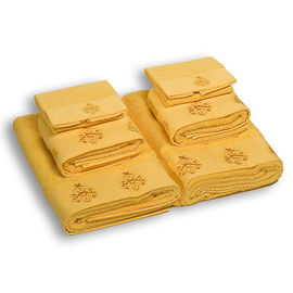 Комплект махровых полотенец из шести предметов хлопок желтый